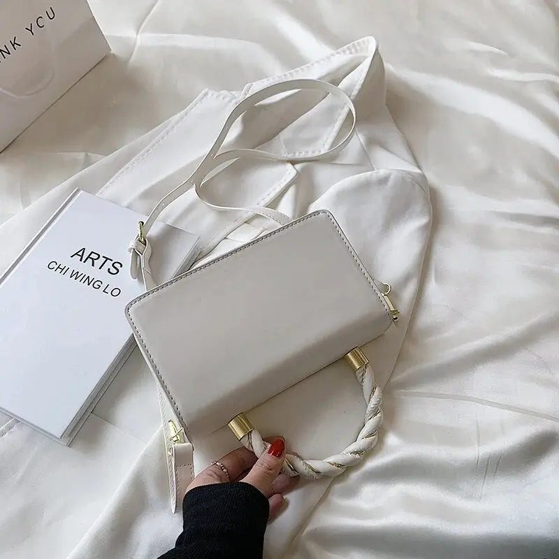 Gold Twisted Fashionable Handbags fashionnsio